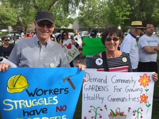 League members holding posters at May Day 2018 event