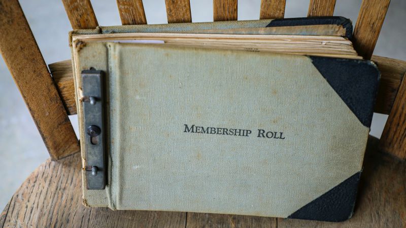 Photo by Mick Haupt on Unsplash Photo of old fashioned membership roll book