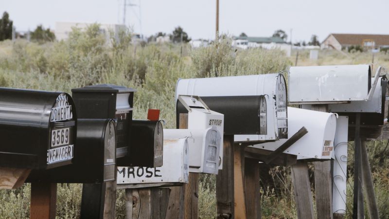 Photo by Yannik Mika on Unsplash Some letterboxes in a row on a typical american street.