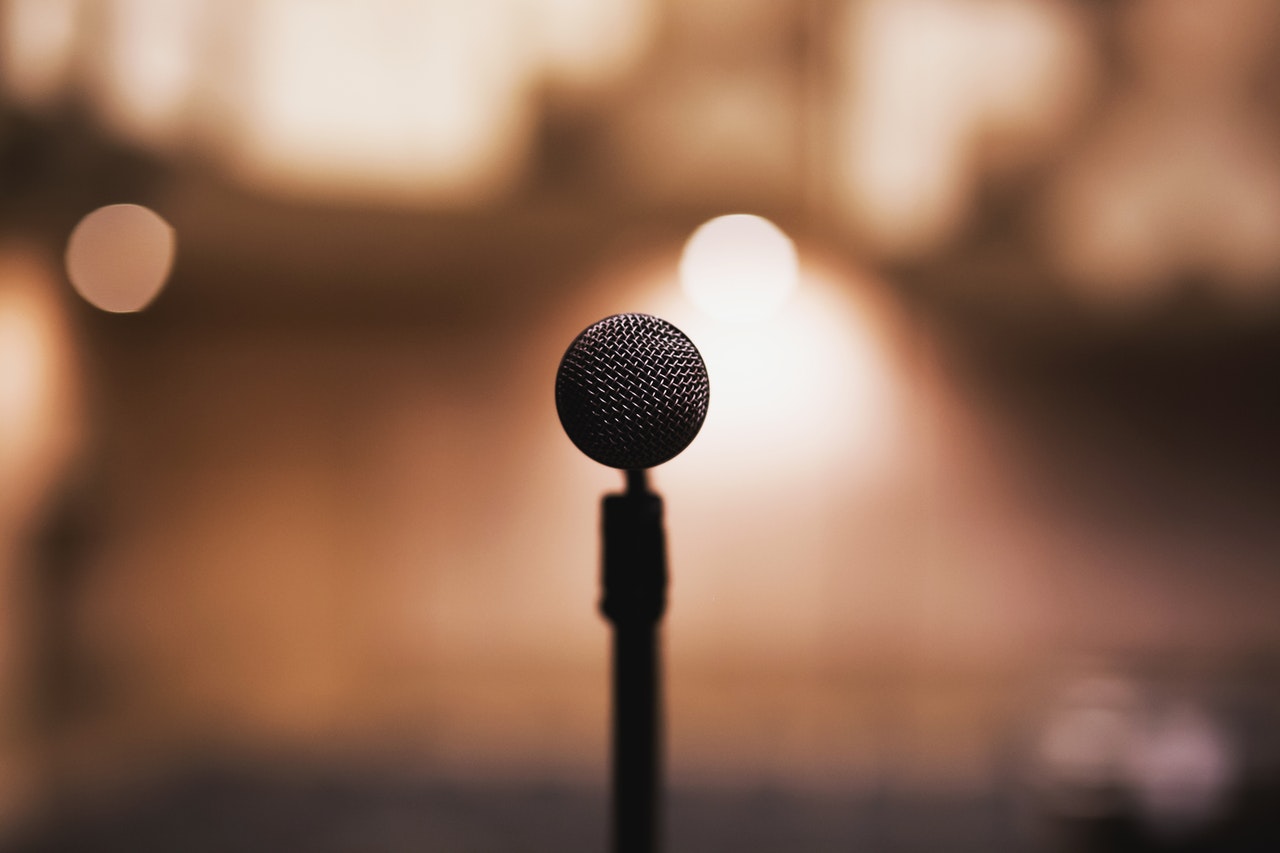 Stand microphone is focus against a blurred background