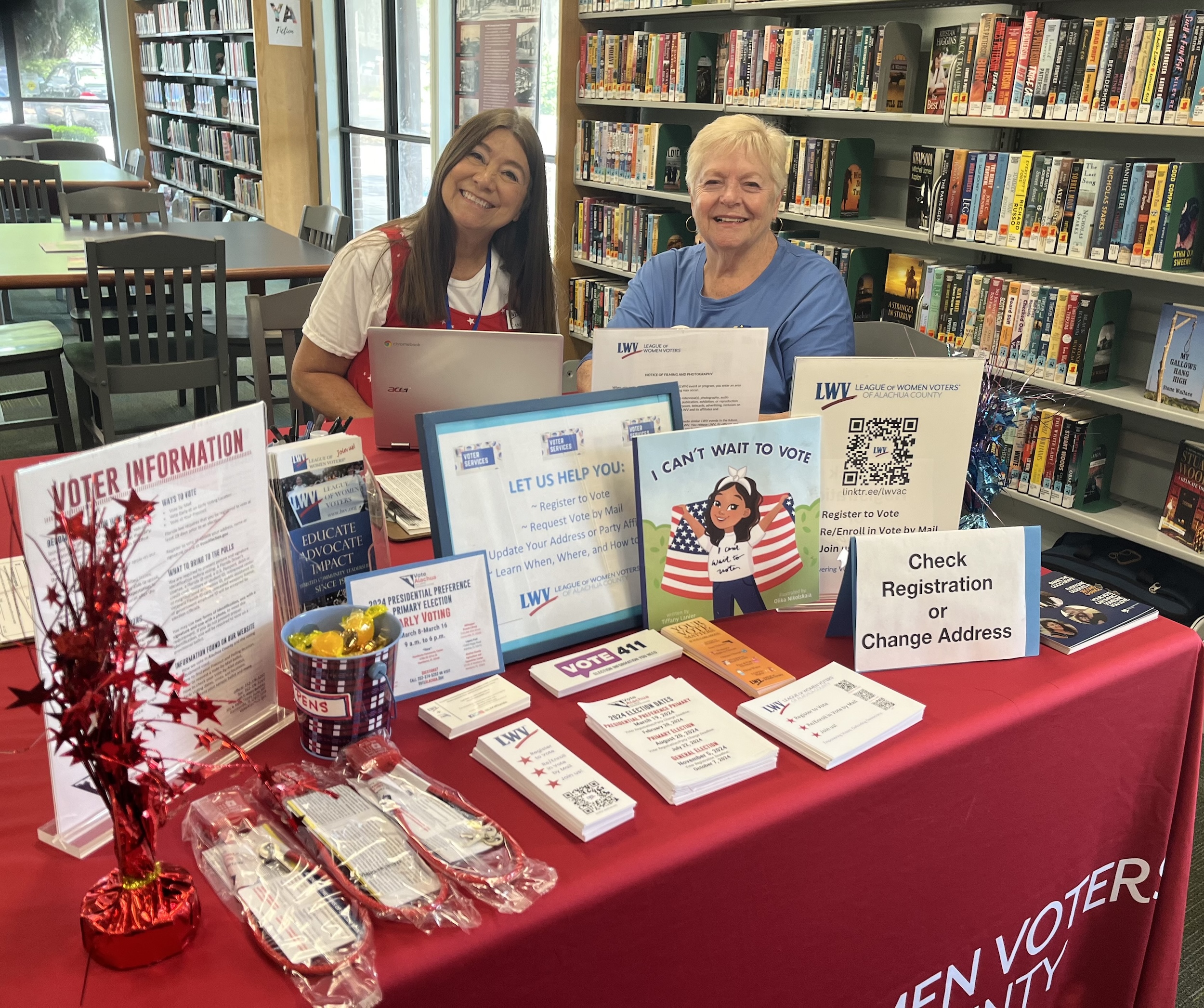 LWVAC members tabling at the library 
