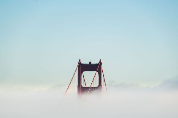top of Golden Gate Bridge in fog