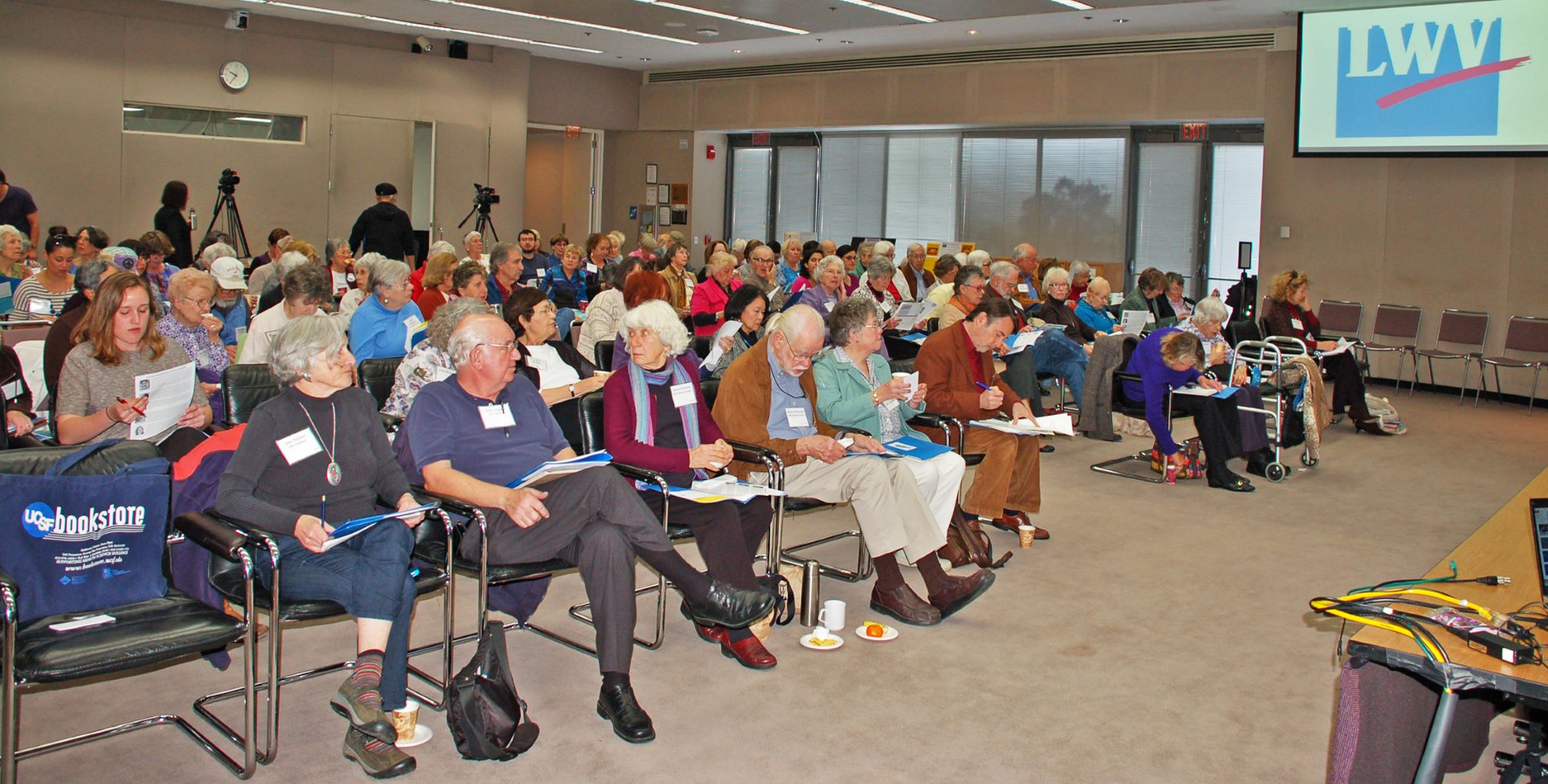 League members at a presentation