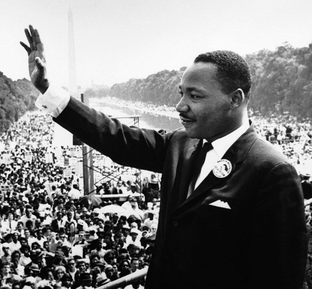 Martin Luther King Jr. addresses a crowd from the steps of the Lincoln Memorial