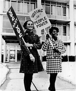 Women Walking with Vote signs