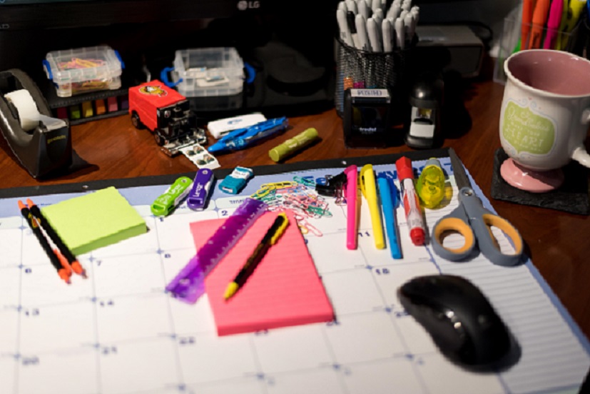 desk calendar, pencils, tape, etc.