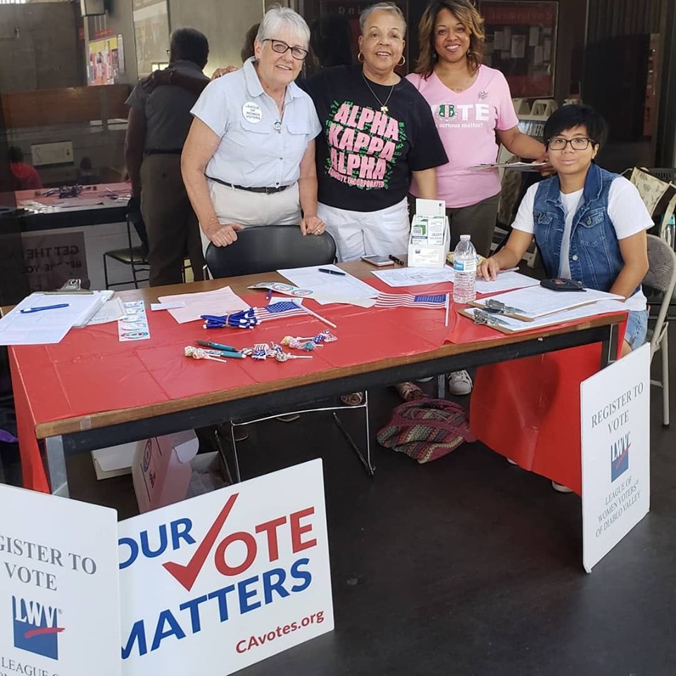 Four people ready to register voters
