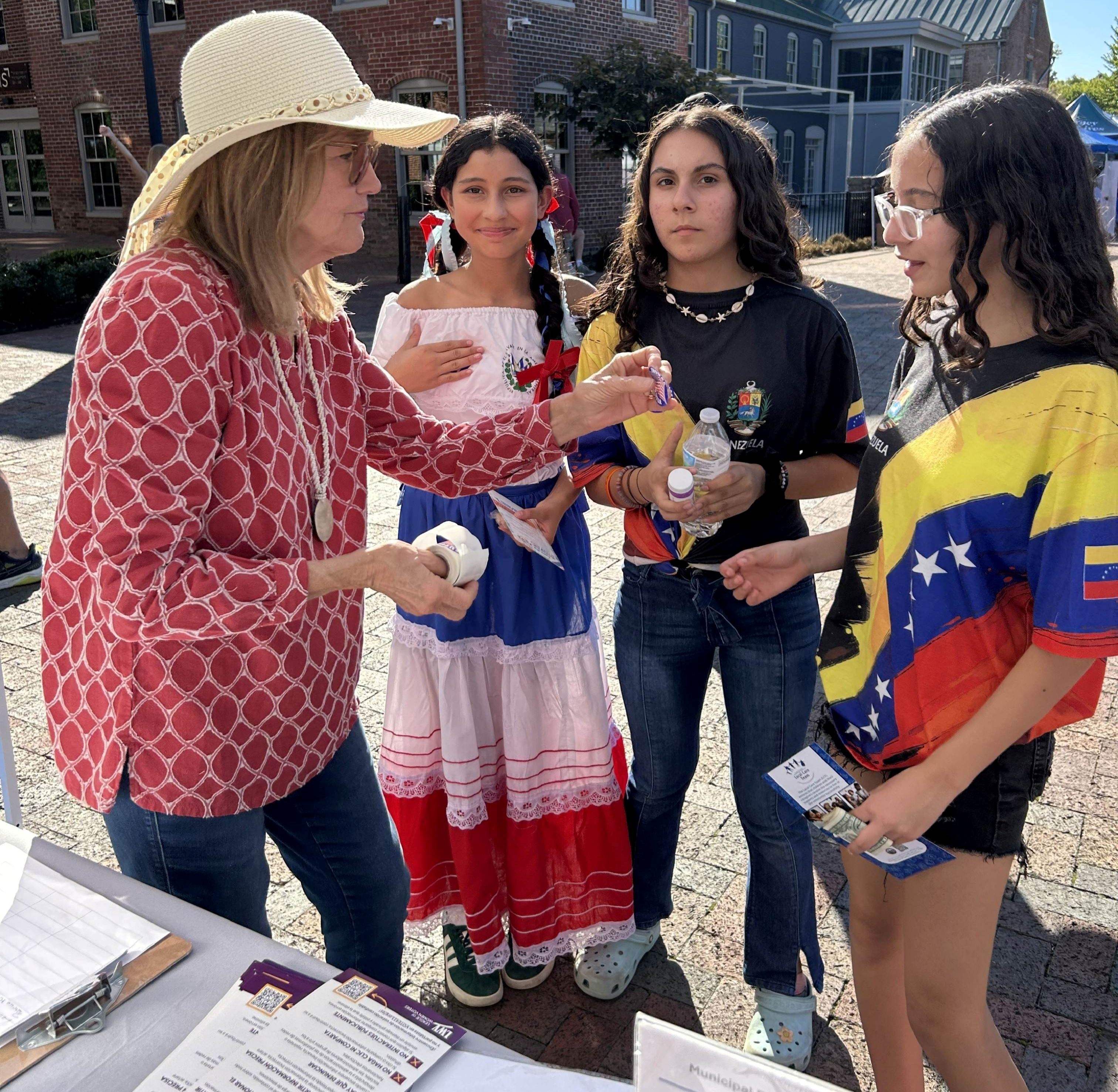 Mary Sue talks to Future Voters at Hispanic Heritage Festival 2025