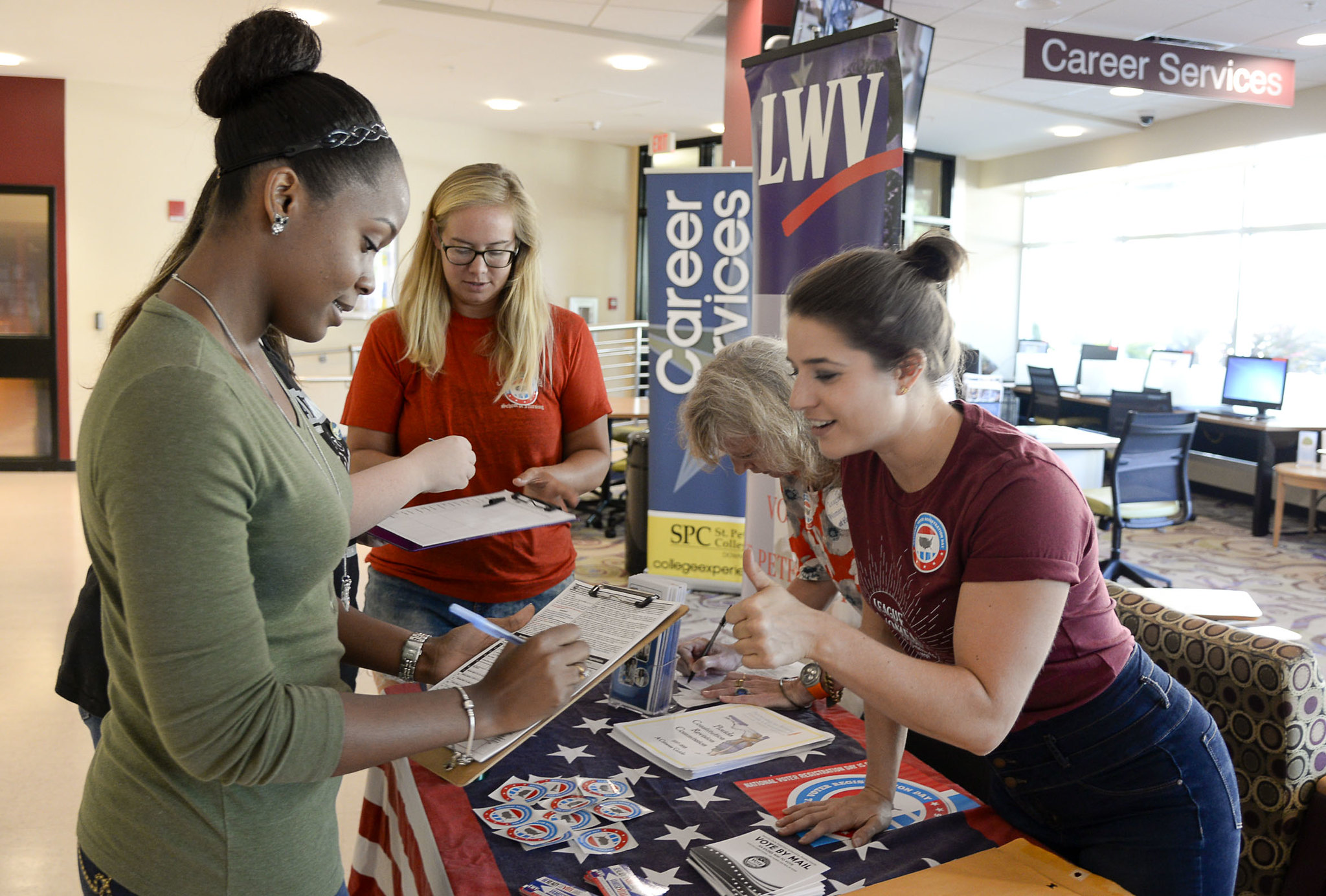 LWV members register new voters on college campus