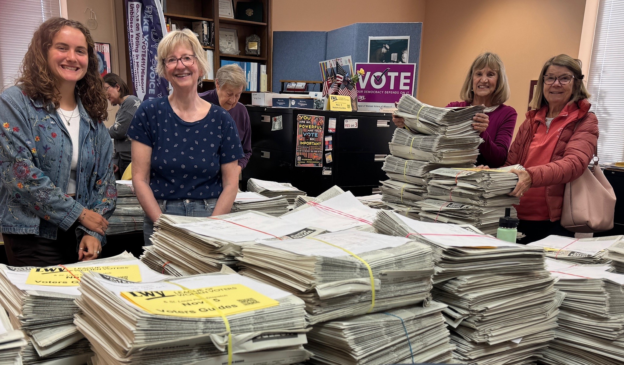 Volunteers package more than 10,000 guides for distribution