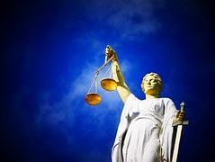 image of Lady Justice holding balanced scales