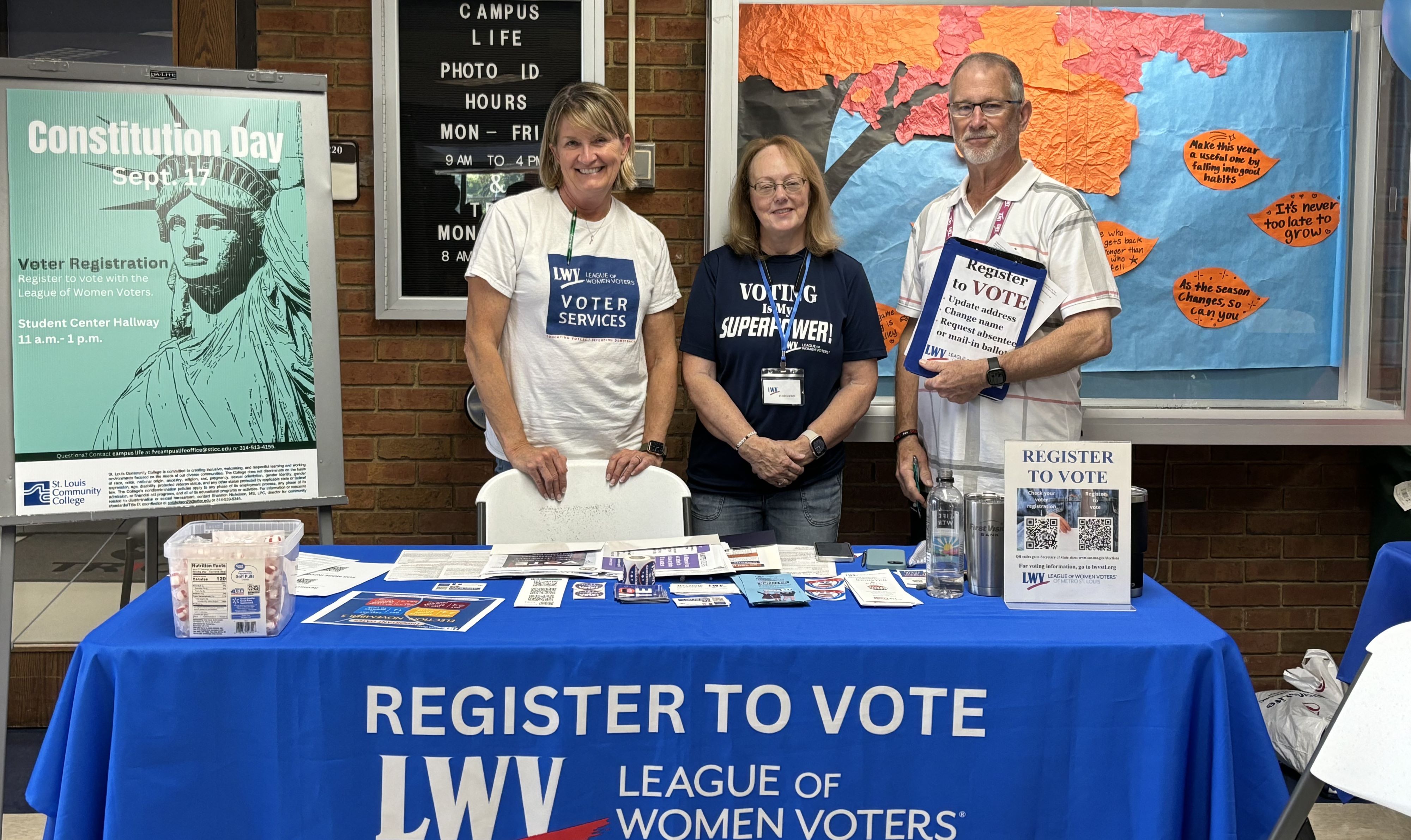 Members register students on a college campus