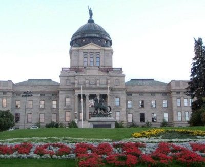 image of Montana state capitol building with flower beds in foreground