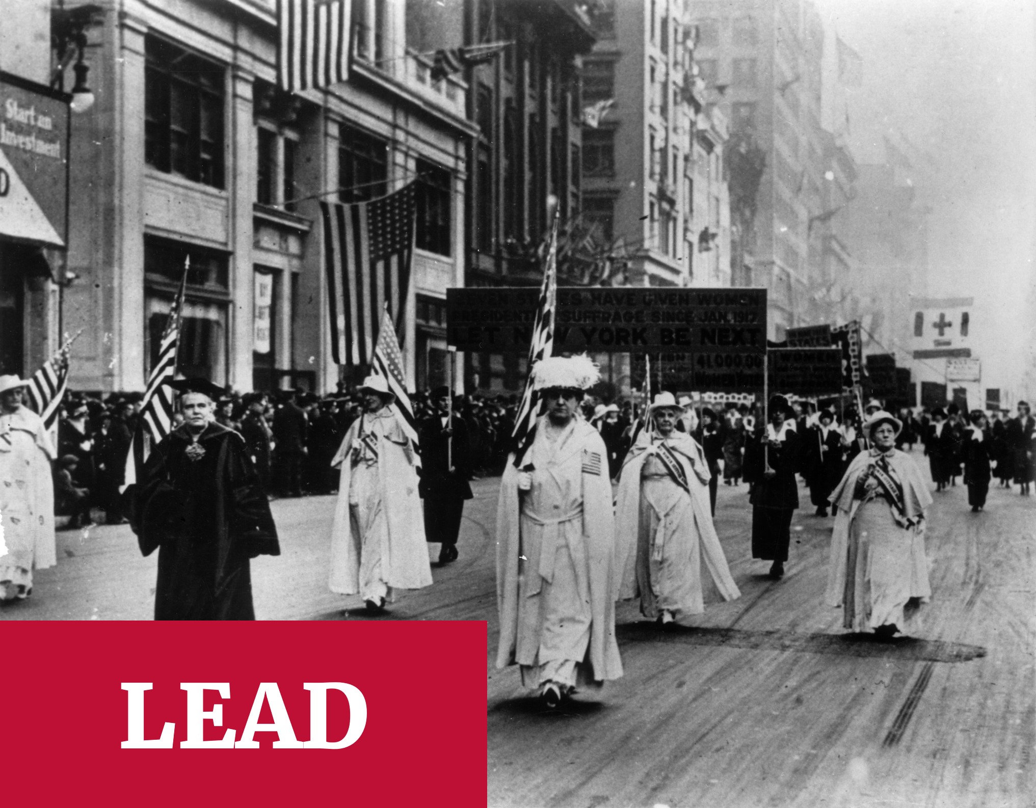 LEAD -  Historical photo of LWV marching the streets of Chicago, IL