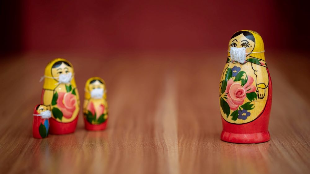 Photo by Evgeni Tcherkasski on Unsplash nesting dolls with masks social distancing