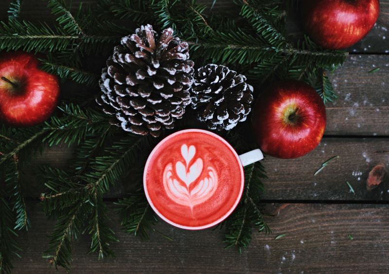 Photo of Hot Cup of Tea, Apples and Pinecones