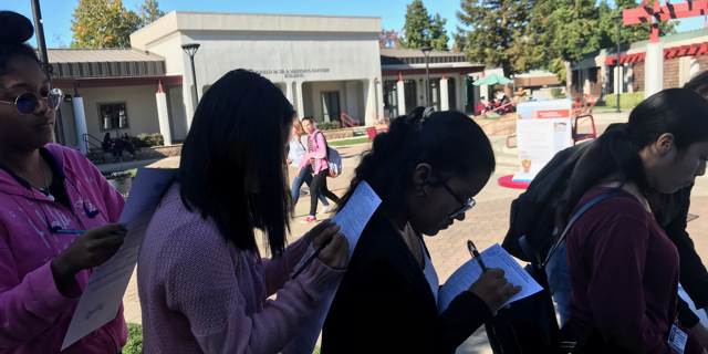 Registering students to vote.