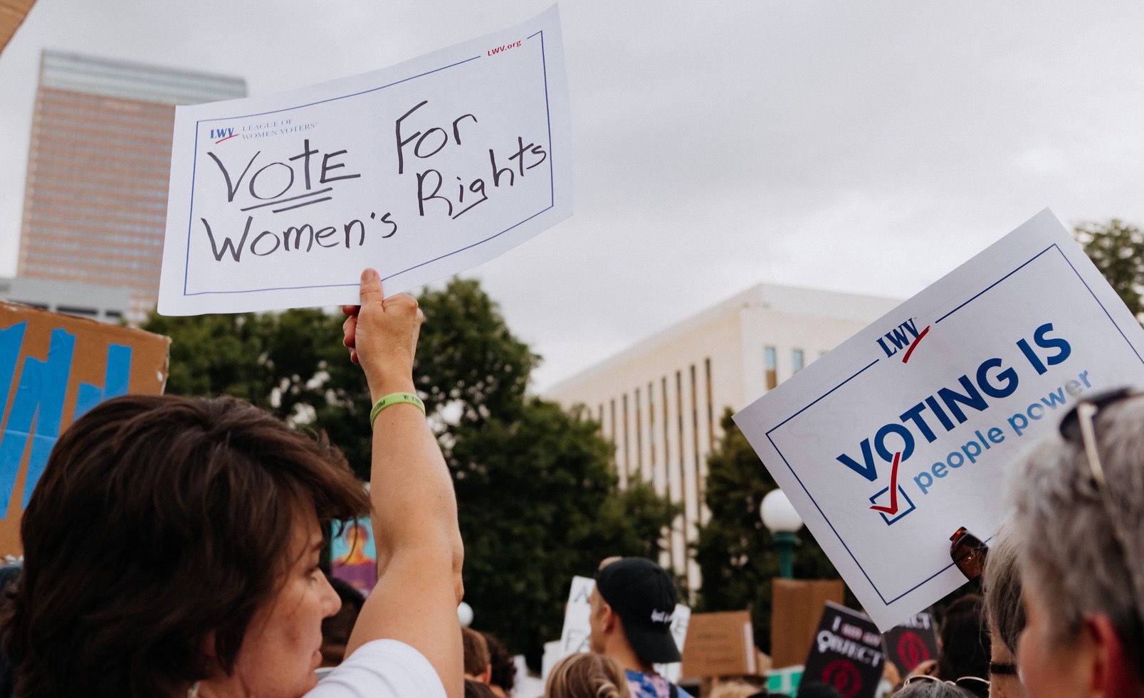Vote for women's rights. Voting is people power. 