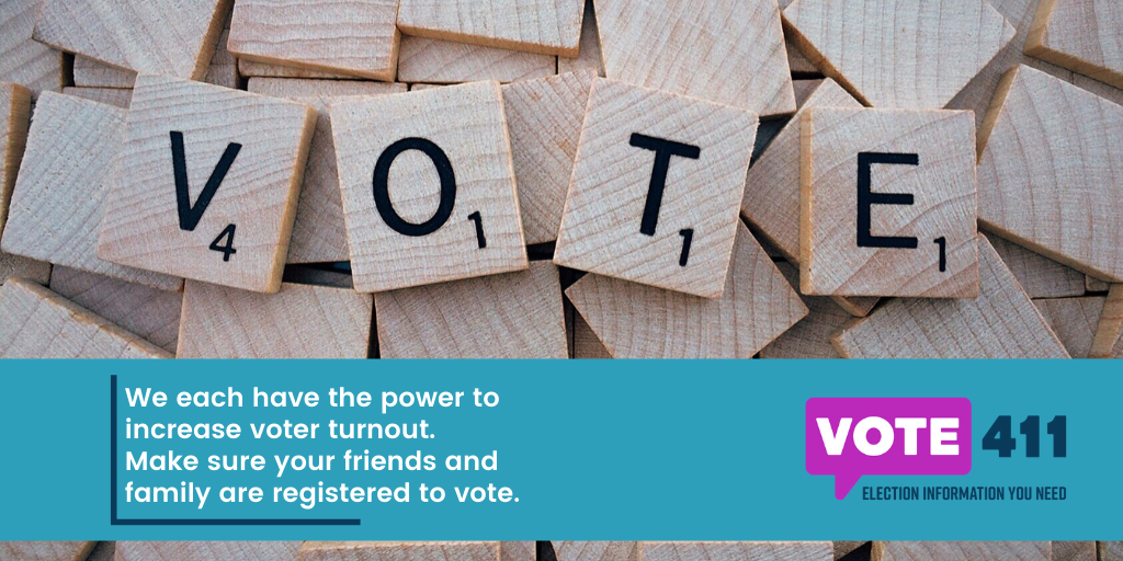 scrabble tiles spell VOTE