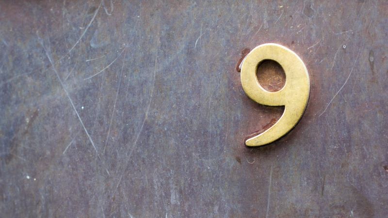 Photo by HENCE THE BOOM on Unsplash Brass number nine on slate background