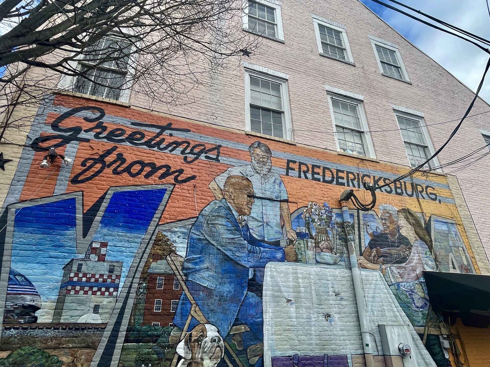 Welcome art on a building in Fredericksburg