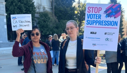Amaris Lebron (left), LWVC Comms Coordinator, and Brittany Stonesifer (right), Common Cause Voting Rights and Redistricting Program Manager, attend rally at the Capitol