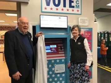 Jim and Rebecca Mauch unveil new Voting Booth exhibit at Lewisburg Children's Museum. Voting Booth, Children's Museum exhibit