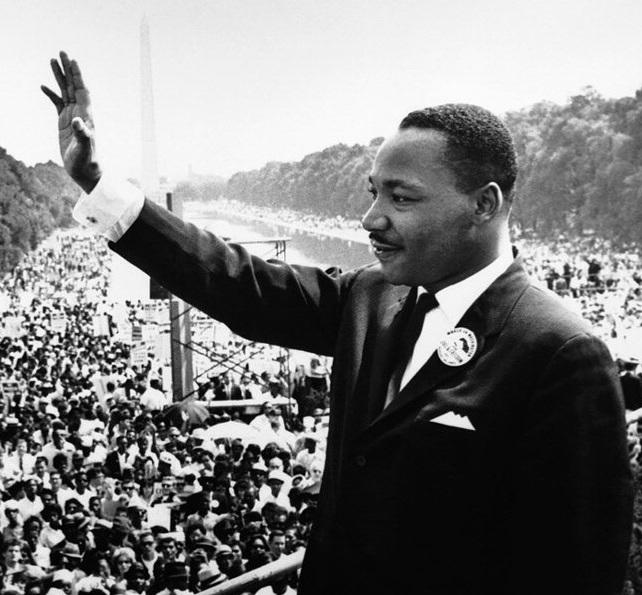 Martin Luther King Jr. addresses a crowd from the steps of the Lincoln Memorial