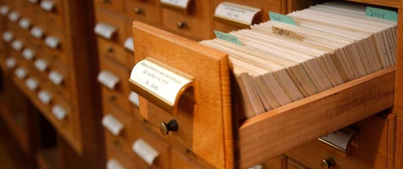 photo of an open drawer of a card catalog