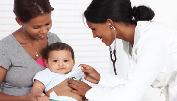 Family medical visit Mother and child with female doctor