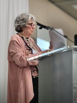 LWV-VA President Joan Porte at the Podium at the 2025 LWV-VA Convention