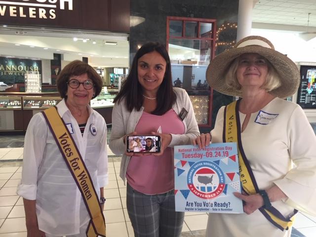 Pictured: Rosemary Shields and Anita Rogers with the first person to register on National Voter Registration Day