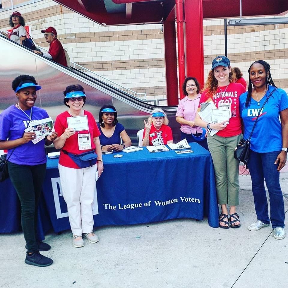 LWVNCA members Registering voters at Washington Natiionals Game, Sept 2018 Voter registration table at Washington Nationals Stadium, 2018