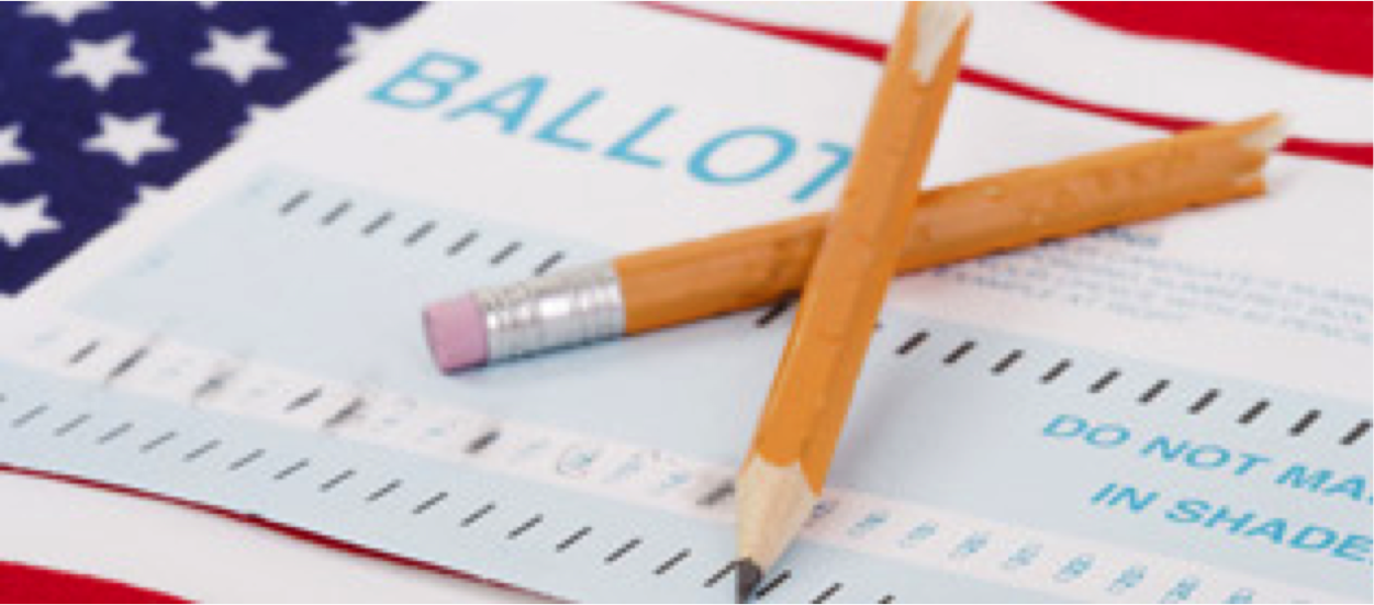 two pencils on top of a ballot