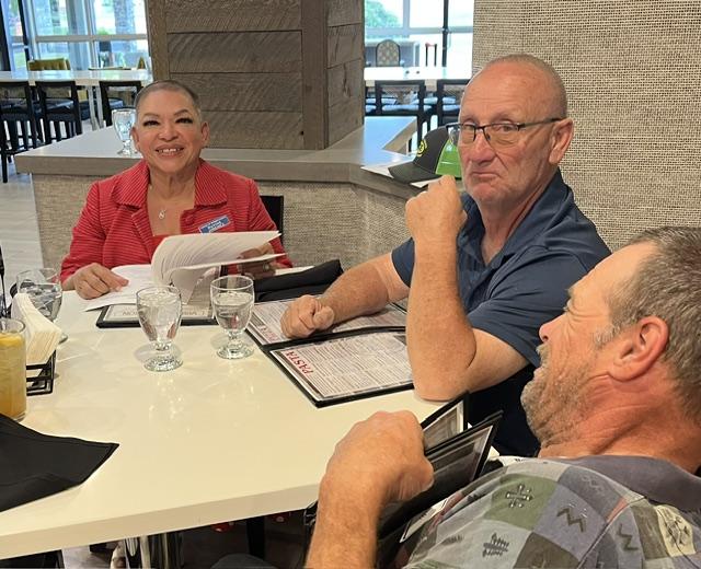 Three LWVBF members at the 2026 Annual meeting