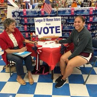 Amarillo League registering new voters. Long time LWV-Amarillo member, LouAnn Garrett registers a new voter
