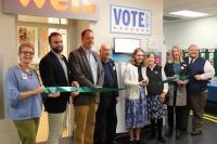 Cutting the ribbon for Voting Booth at Lewisburg Children's Museum 2019
