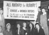 "All Aboard for Albany" sign with League members - 1940s Historical Photo