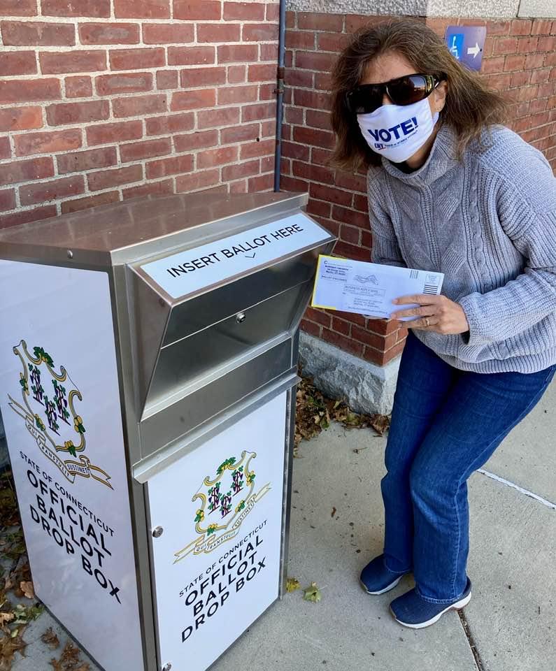 CT Absentee Ballot Drop Box LWVSECT Member with Ballot and VOTE Mask