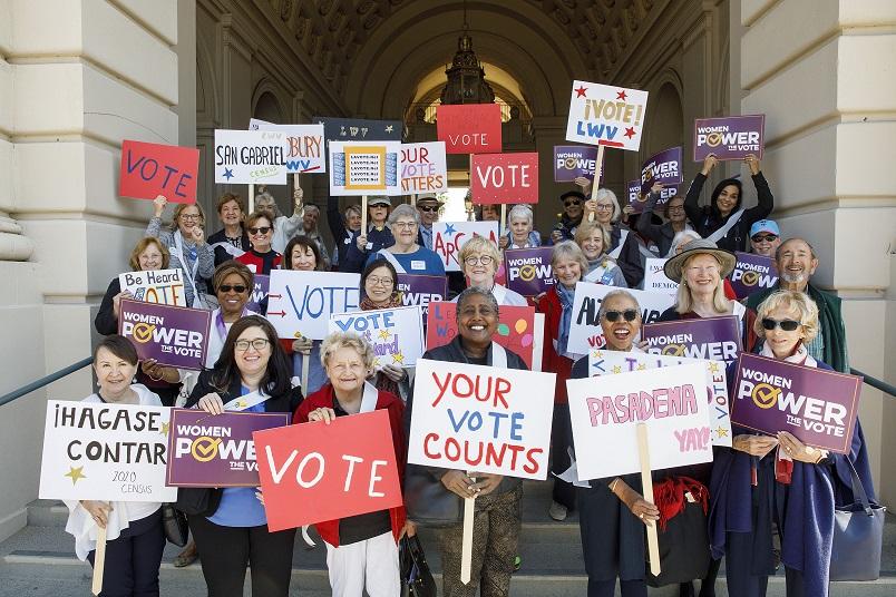 Group of People Holding Vote Signs Credit LWVUS