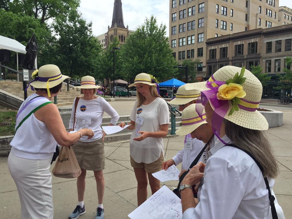 Attendees wearing white in homage to suffragists