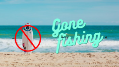 Surfboard on Beach with Sign "Gone Fishing" No Board Meeting