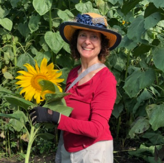 Janice holding sunflower