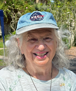 Rosalie Bandyopadhyay in a blue NASA ballcap