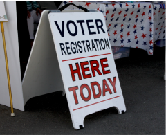 Image of Voter Registration Here sign