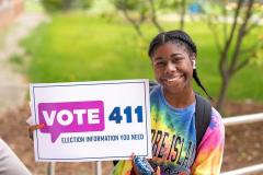 Girl with vote411 sign