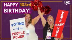 two people holding up signs and red pom poms for lwv 103 birthday (left) voting is people powered (right)vote baby vote