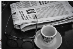 Newspaper and cup