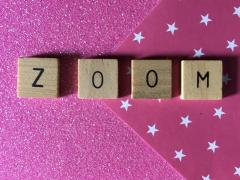 The word "Zoom" spelled out with scrabble letters