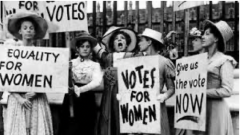 Suffragettes, with signs
